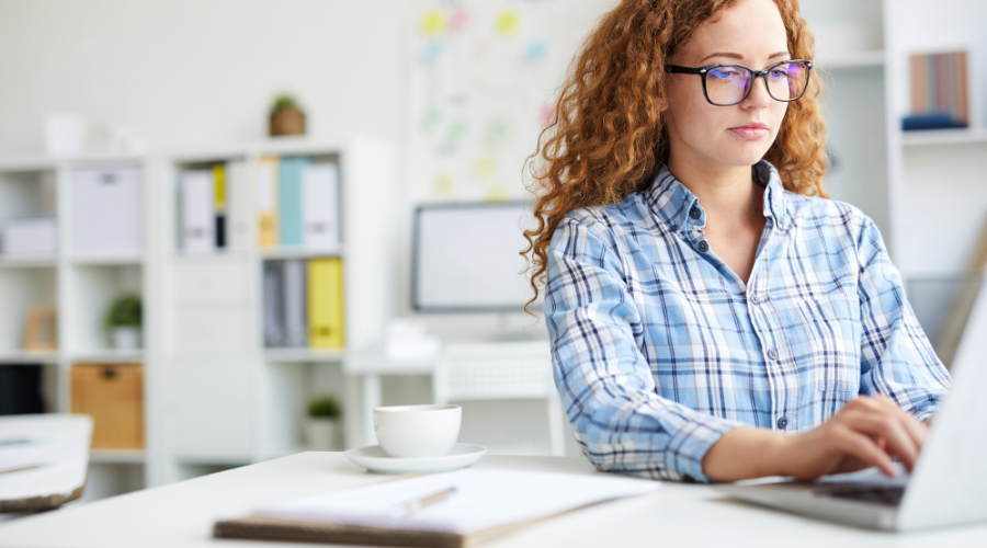 Overwhelmed data-analyst searching through multiple SEO dashboards